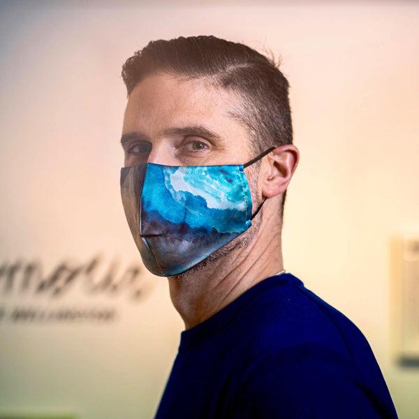 Paul Desbaillets Wears Blue Nathon Kong Silk Face Mask